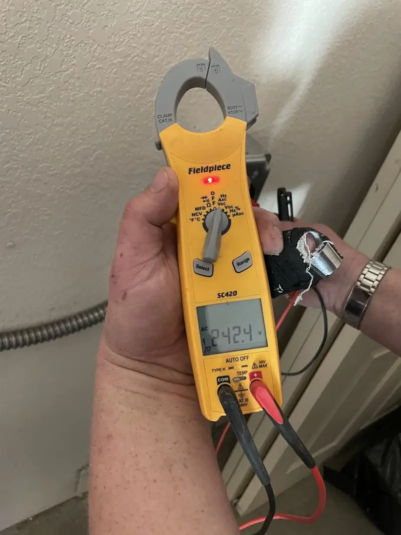 Voltage testing with clamp meter during Electrical Installation Services in Staunton